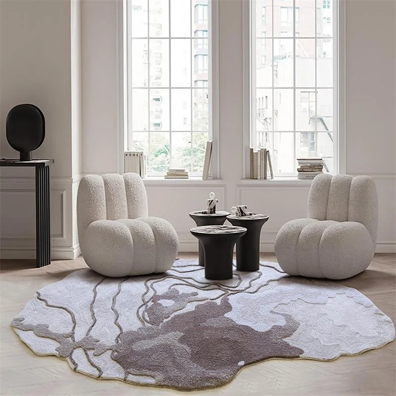Estuary irregular shaped rug in oyster and mink in a bright living room