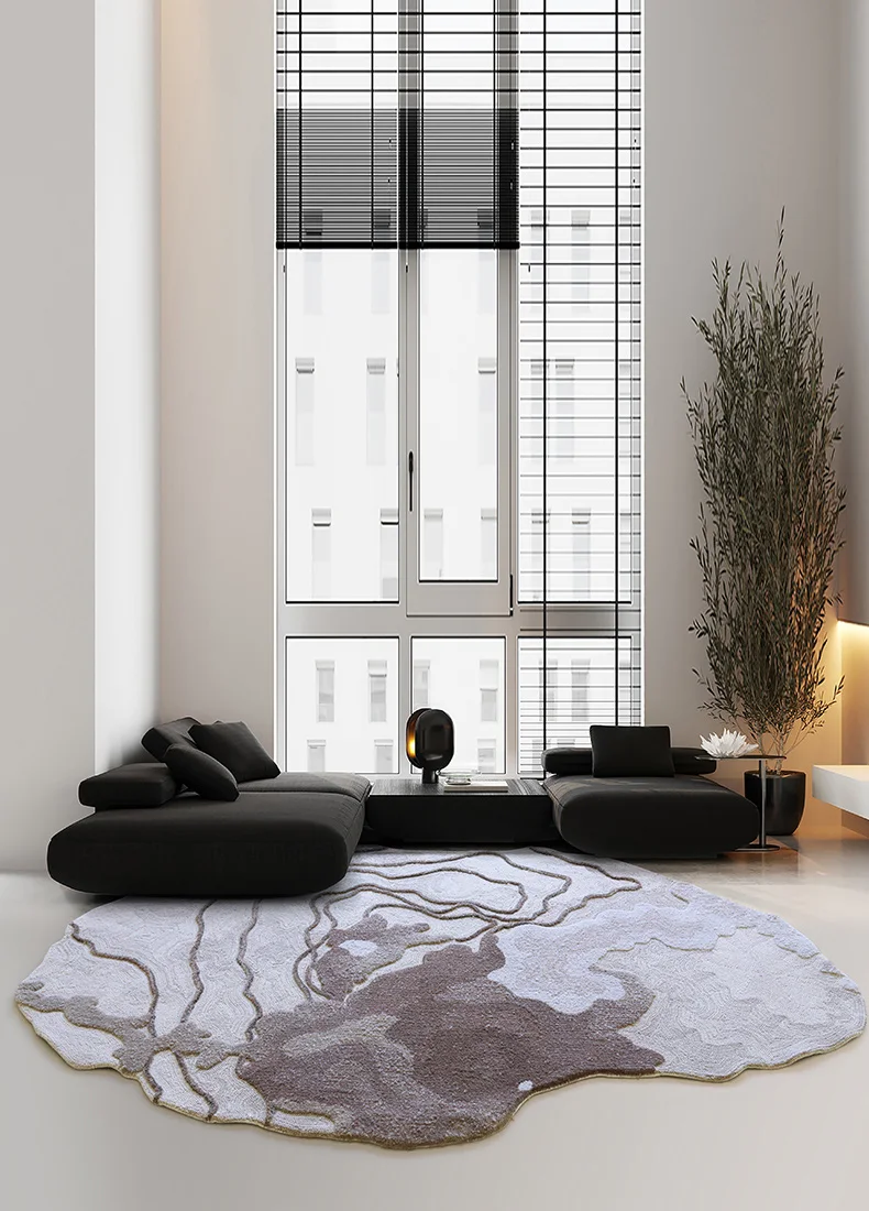 Estuary irregular shaped rug beneath a black sofa